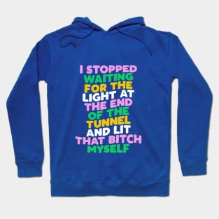 I Stopped Waiting for the Light at the End of the Tunnel and Lit That Bitch Myself by The Motivated Type in Blue Pink Green and Yellow Hoodie